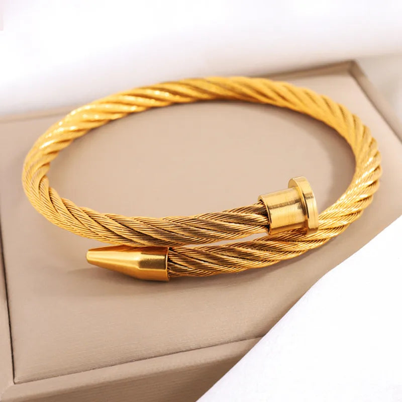 Cable nail bangle, 18K gold plated stainless steel