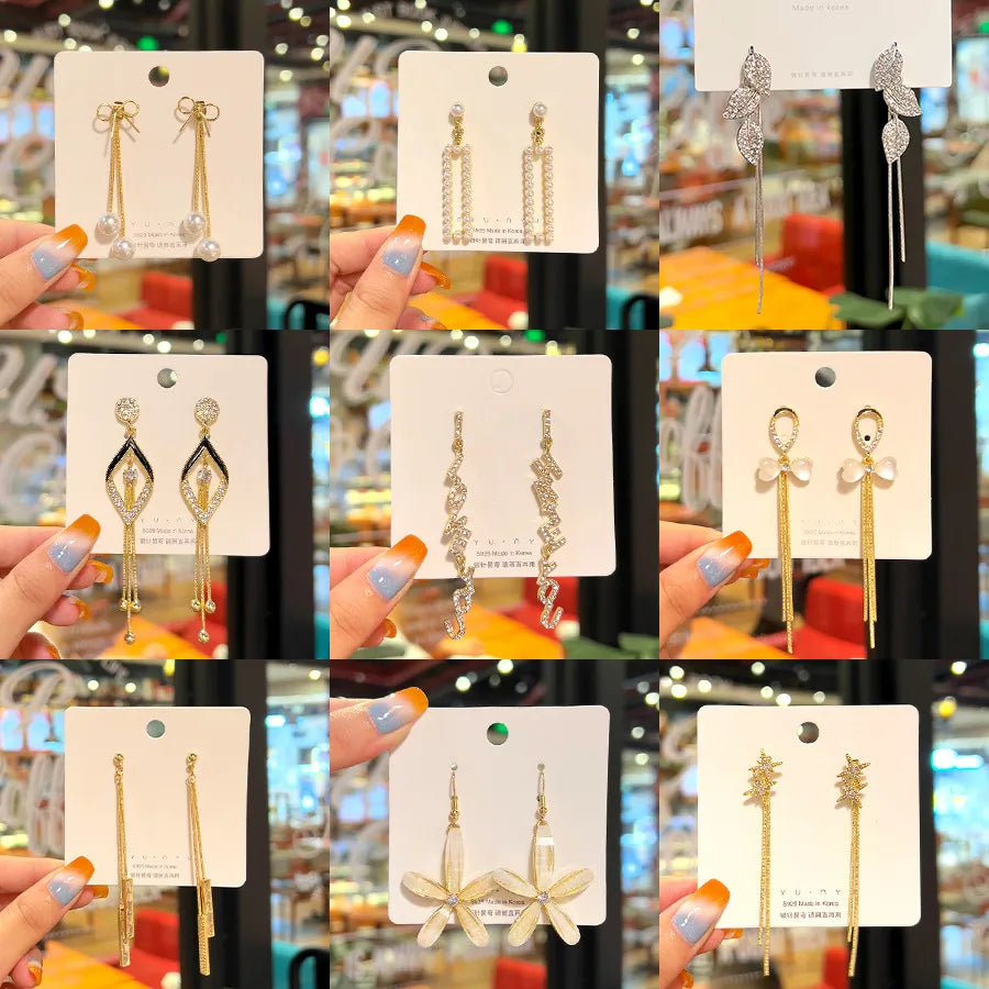 Elegant geometric pearl tassel earrings with rhinestone inlay
